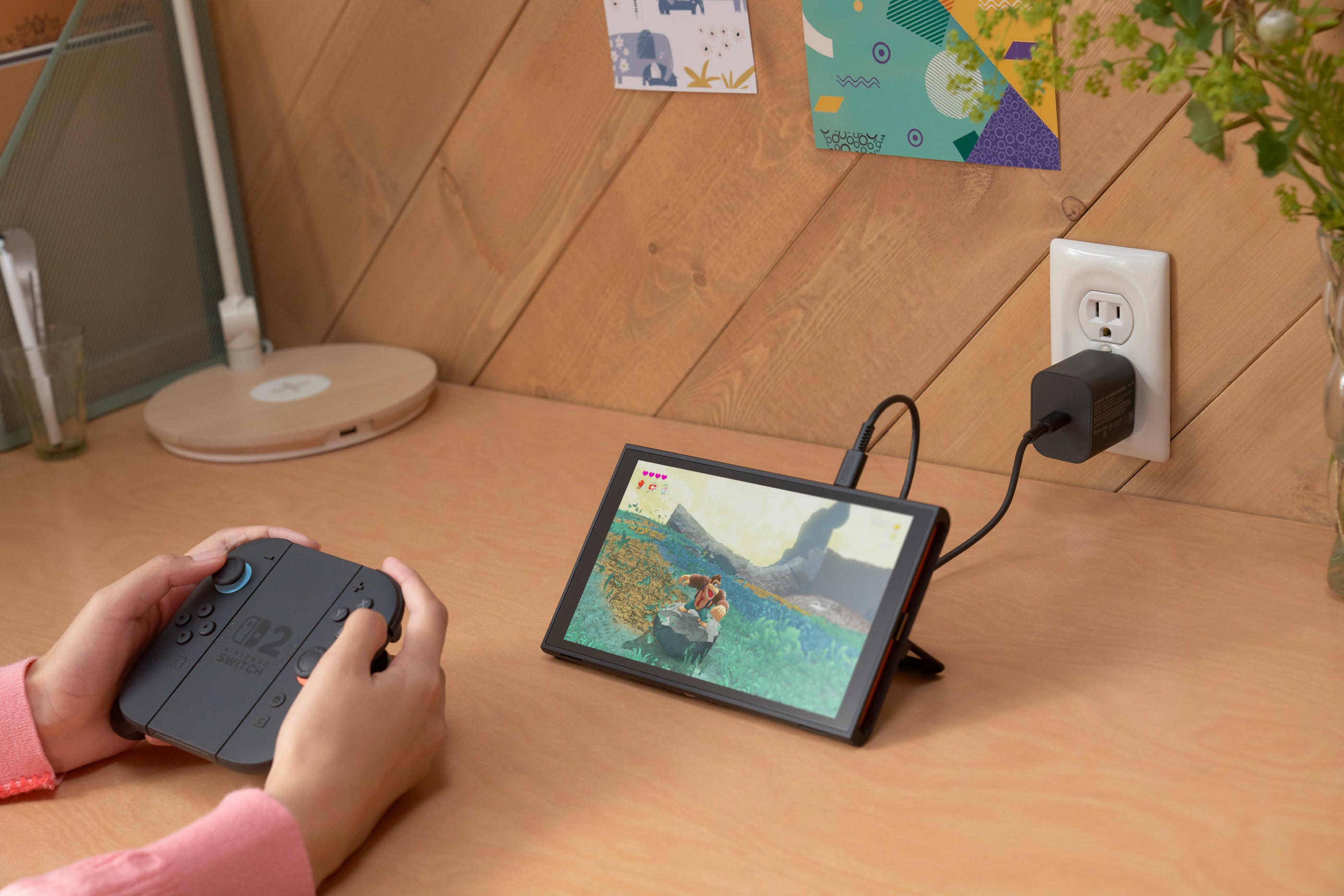 Nintendo Switch 2 in tabletop mode with Joy-Con controllers on a desk