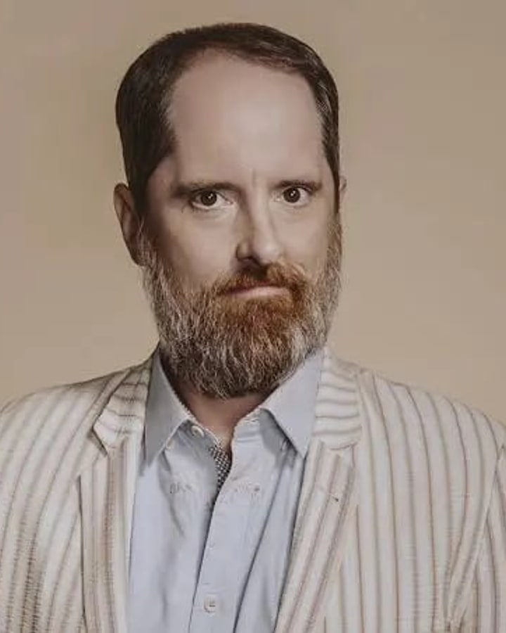 Brendan Hunt as Coach Beard